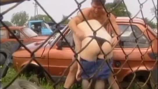 Busty chick fucking in car lot